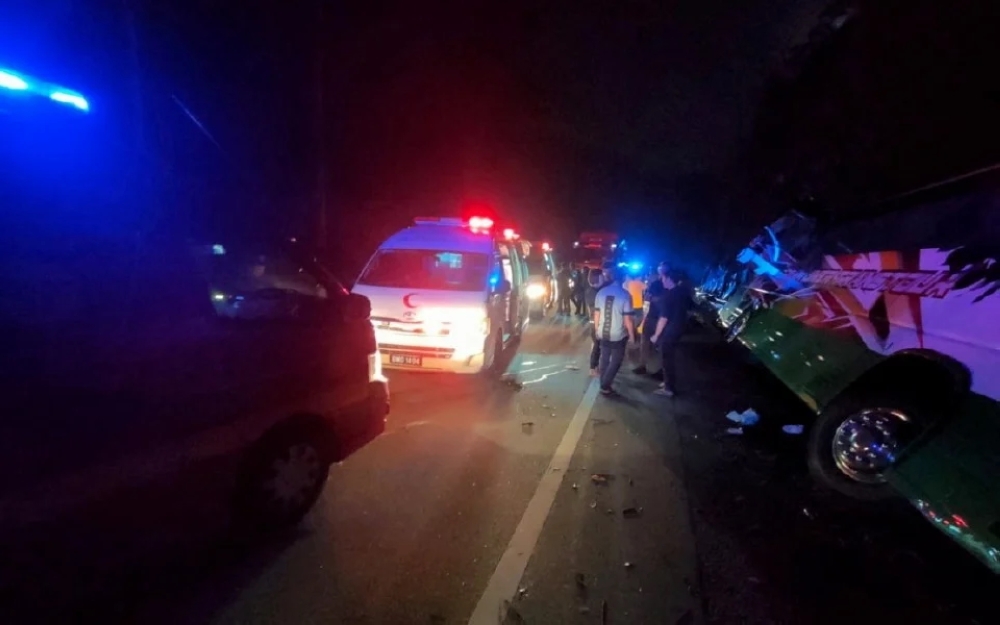 The aftermath of the incident involving an express bus heading to Cameron Highlands near Dewan MRA, Pos Slim, Jalan Simpang Pulai, in Ipoh this morning, that left three people injured. — Perak Fire and Rescue Department pic