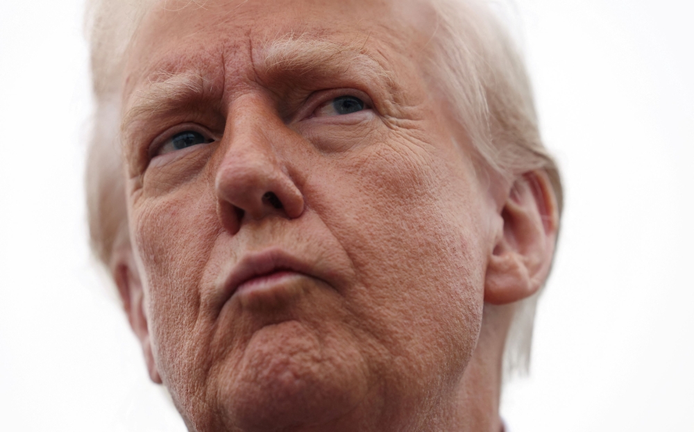 Donald Trump issued an executive order on January 20 requiring intensified security vetting of any foreigners seeking admission to the US to detect national security threats. — Reuters pic