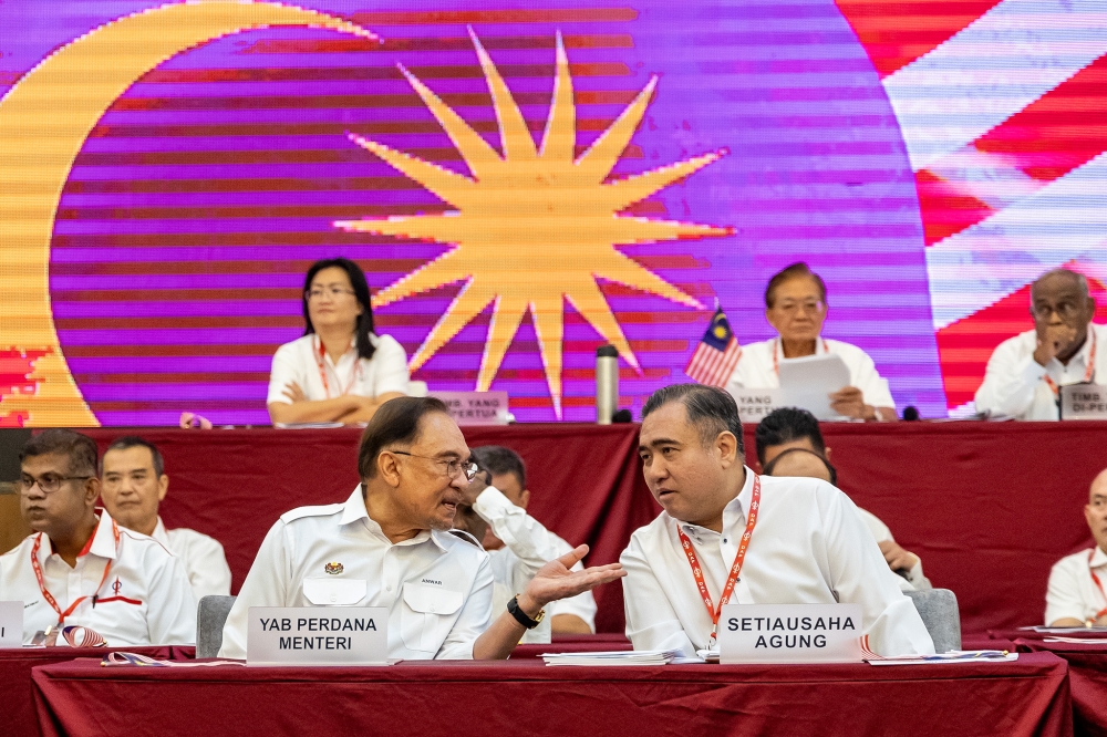 Prime Minister Datuk Seri Anwar Ibrahim and DAP secretary-general Anthony Loke attend the 18th DAP National Congress at Ideal Convention Centre (IDCC) in Shah Alam March 16, 2025. — Picture by Firdaus Latif