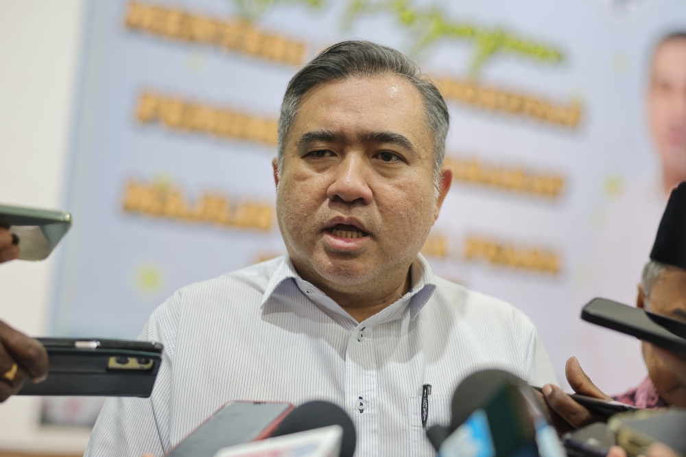 Transport Minister Anthony Loke speaking to the media after the Meeting with Community Leaders and Iftar Ceremony at the Taman Coral Height Community Hall, Sikamat, yesterday. — Bernama pic