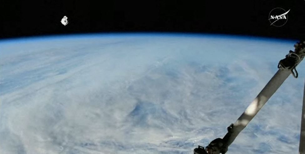 This screengrab made from a NASA livestream shows the SpaceX Dragon crew spacecraft that reached the International Space Station on Sunday. — AFP pic