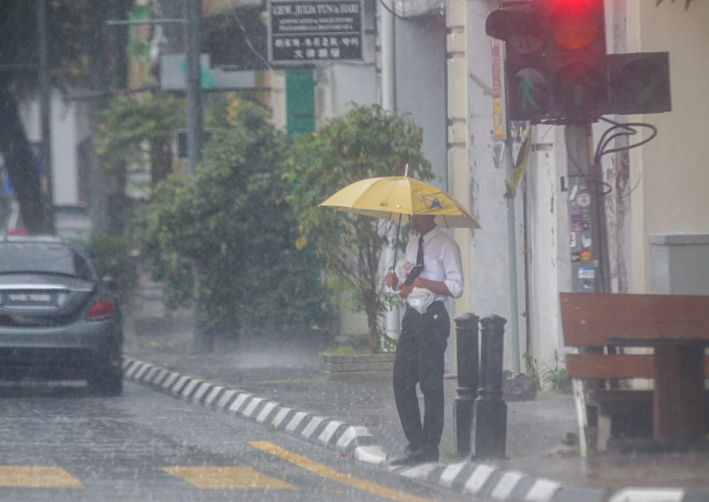 The Malaysian Meteorological Department has issued a severe-level continuous rain warning in Johor until Friday. — Picture by Farhan Najib 