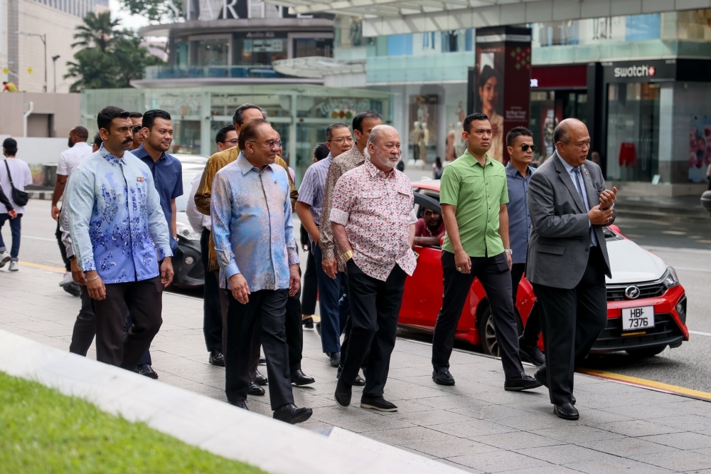 His Majesty Sultan Ibrahim, King of Malaysia today spent some time with Prime Minister Datuk Seri Anwar Ibrahim to go on a walkabout around the city’s vibrant Bukit Bintang area here. — Picture via Facebook/Anwar Ibrahim