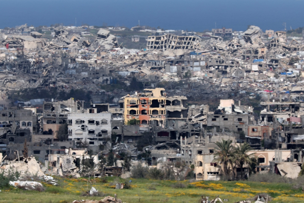 This picture, taken from Israel's southern border with the Gaza Strip, shows destroyed buildings in northern Gaza on March 19, 2025. — AFP pic