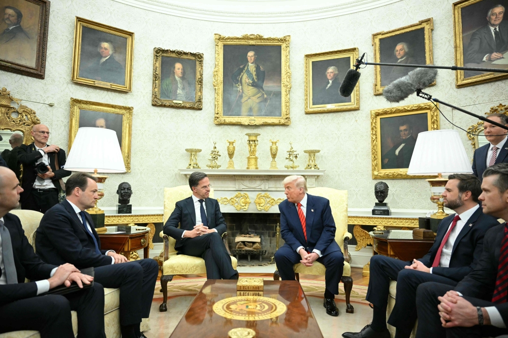 US President Donald Trump meets with NATO Secretary General Mark Rutte in the Oval Office of the White House in Washington, DC, on March 13, 2025. — AFP pic