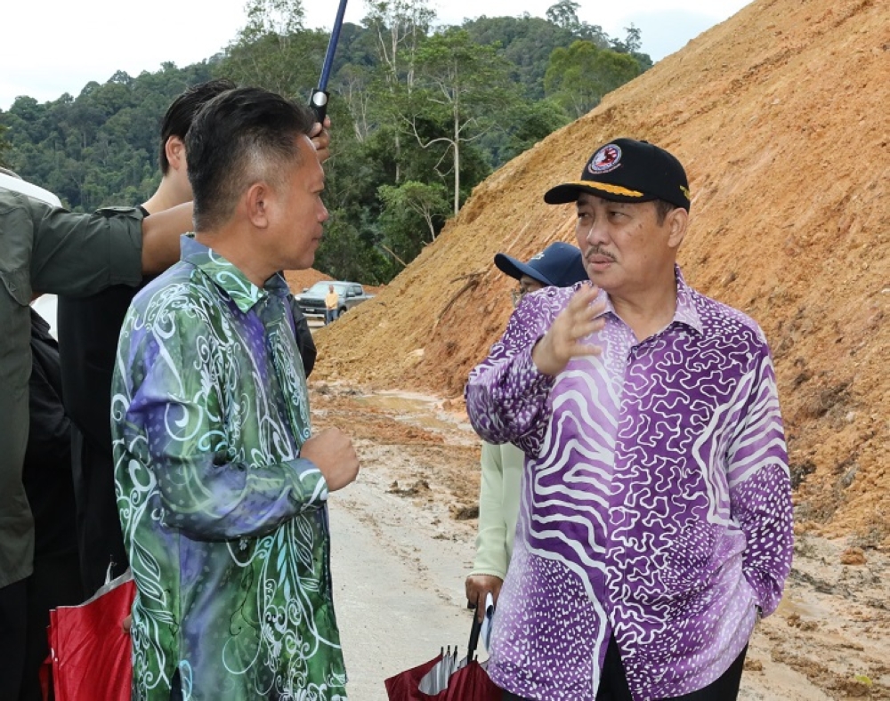 Chief Minister Datuk Seri Hajiji Haji Noor inspected the landslide at Kilometre 14.3 and Kilometre 11.2 of the Kimanis–Keningau Road here on Thursday afternoon. — The Borneo Post