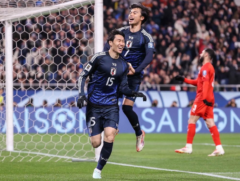 Japan's Daichi Kamada celebrates his goal during the 2026 FIFA World Cup Asian qualification football match against Bahrain. — AFP pic