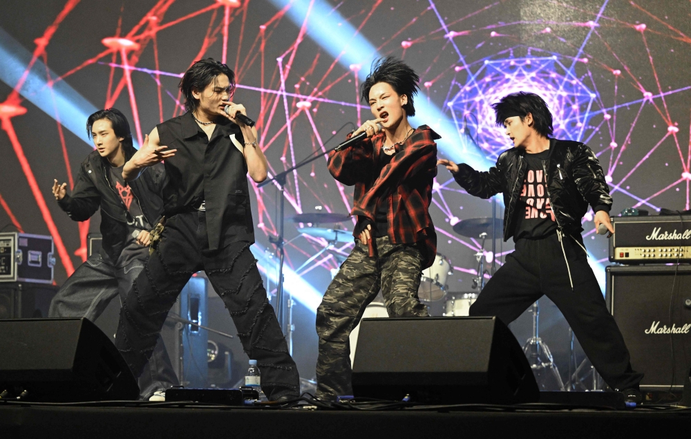 This picture taken on November 25, 2024 shows K-pop group 1Verse members (L-R) Kenny, Aito, Hyuk and Seok performing during a music festival in Suwon. — AFP pic
