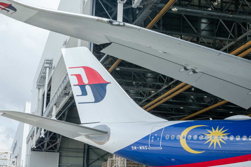 The tail section of a Malaysia Airlines plane is seen at the Kuala Lumpur International Airport on December 19, 2024. — Picture by Raymond Manuel