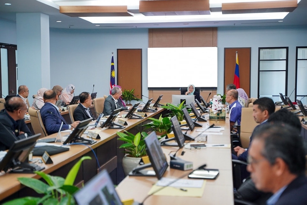 Federal Territories Minister Dr Zaliha Mustafa (centre) chairing the Federal Territories Department Agency Heads Meeting. — Picture from Facebook/Zaliha Mustafa