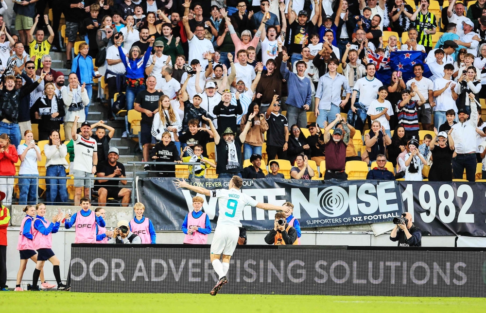 Chris Wood celebrates his early goal during the World Cup 2026 Oceania qualifier semi-final football match against Fiji yesterday. — AFP pic