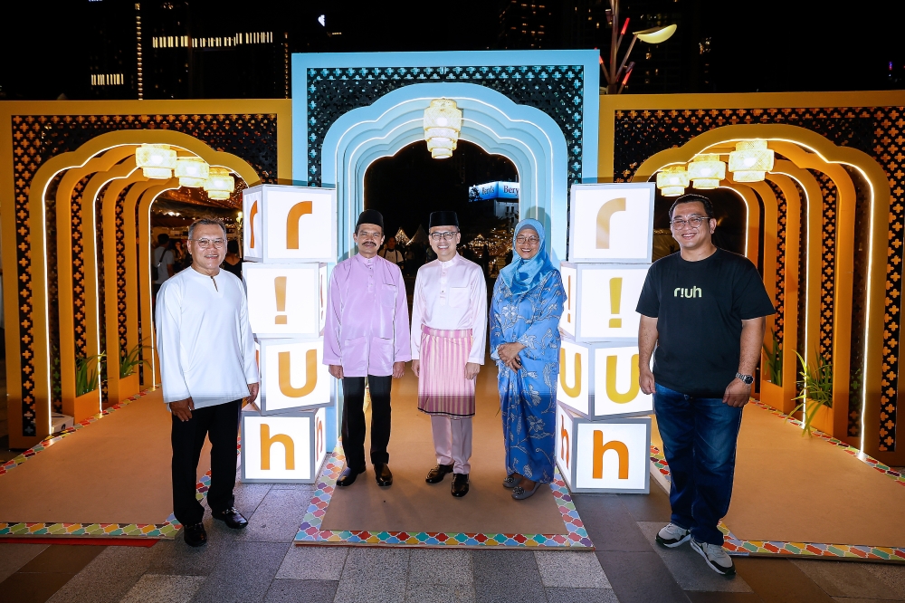 Communications Minister Datuk Fahmi Fadzil (centre) attends the RIUH Raya Kita 2025 event at the Tun Razak Exchange in Kuala Lumpur on March 22, 2025. — Bernama pic