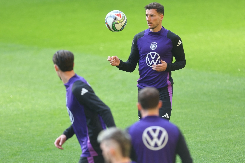 Germany’s midfielder Leon Goretzka (centre) and his teammates attend a training session in Dortmund, western Germany on March 22, 2025, on the eve of the UEFA Nations League quarter-final second leg football match Germany v Italy. — AFP pic