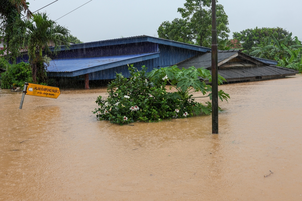 The flood situation at Kampung Pasir Tebrau in Johor March 19, 2025. — Bernama pic