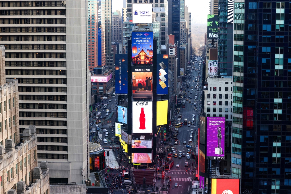 A general view of the Times Square area in New York City on December 27, 2024. In just a few weeks, the US tourism outlook has clouded as a result of some of President Donald Trump’s policy decisions, which have angered some foreign visitors and prompted fear of a surge in prices and a stronger dollar. Foreign traveller arrivals in the United States are expected to decline by 5.1 per cent in 2025 compared to last year, against a previously projected increase of 8.8 per cent, Tourism Economics said in a report published late last month. Their spending is expected to slide 10.9 per cent. — AFP pic