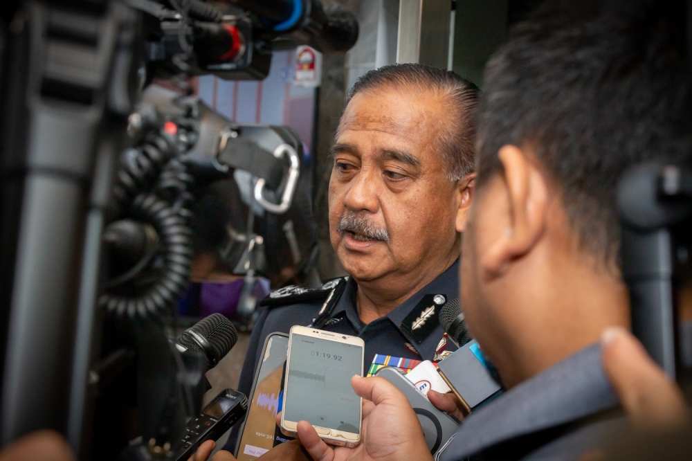 Inspector General of Police Tan Sri Razarudin Husain said influencers and traders exploit the price gap by purchasing untaxed stock from Thailand. — Picture by Raymond Manuel