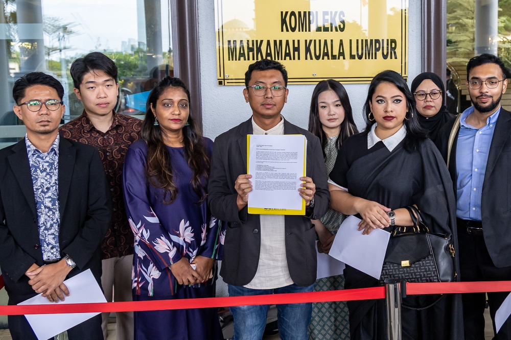 Sekretariat Solidariti Rakyat activists hold a press conference before testifying against their unlawful arrests at the Kuala Lumpur Court Complex, in Kuala Lumpur, on March 24, 2025. — Picture by Firdaus Latif.