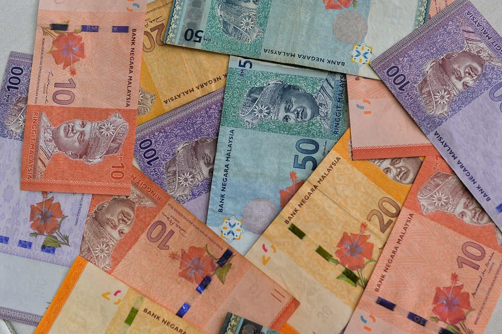 The ringgit opened higher today on expectations that Malaysia will be among the least affected by the US government’s implementation of reciprocal tariffs on April 2, given that the country is seen as having one of the lowest tariff rates. — Picture by Miera Zulyana