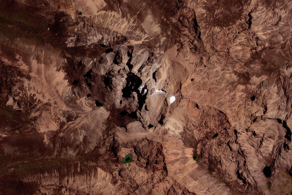 This handout satellite image taken by 2025 Planet Labs PBC on August 31, 2024 shows the glacier on Mount Kenya located inside Mount Kenya National Park. — Planet Labs handout via AFP
