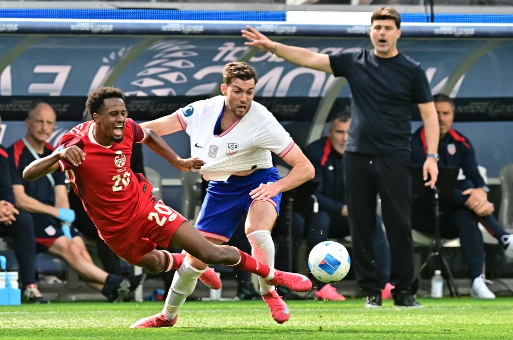 USA’s Argentine coach Mauricio Pochettino gestures as Canada’s midfielder #20 Ali Ahmed and USA’s defender #19 Joe Scally vie for the ball during the Concacaf Nations League third place final football match between USA and Canada at SoFi Stadium in Inglewood, California March 23, 2025. — AFP pic