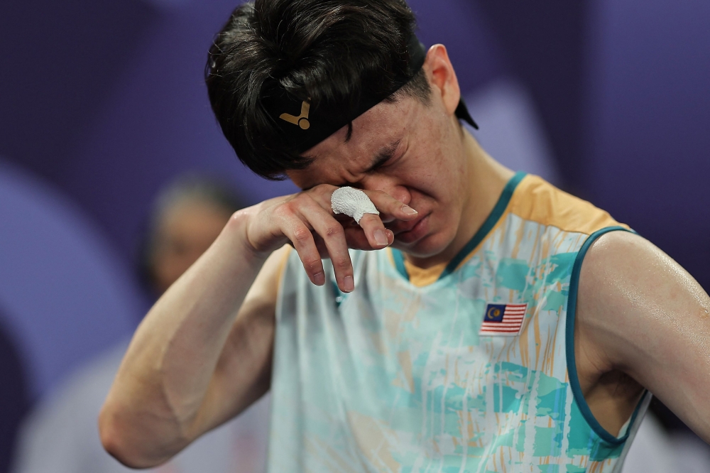 Professional men’s singles shuttler Lee Zii Jia may be out of action for a while as his team, Team LZJ, has successfully applied for his ranking protection under the Badminton World Federation (BWF). — Reuters pic