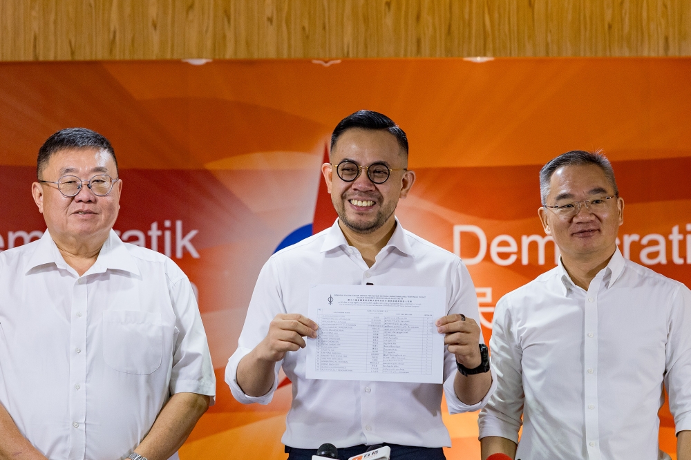DAP's Steven Sim speaks to reporters ahead of the party's 18th national congress. March 3, 2025. — Picture by Firdaus Latif