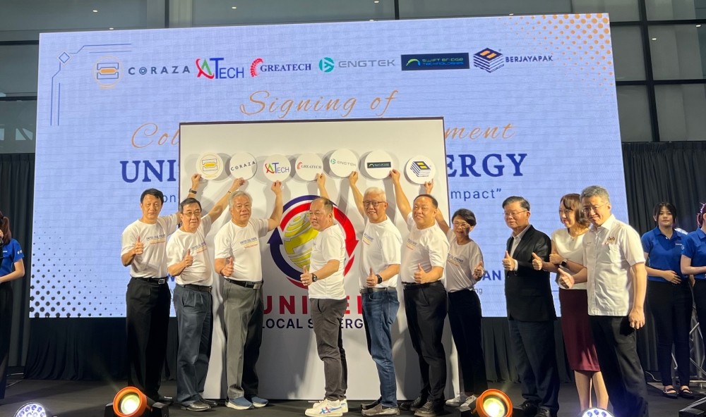 The launching ceremony of the united local synergy programme between Greatech Mechatronics, Aurelius Technologies, Coraza Systems, Berjayapak, Swift Bridge Technologies, Prodelcon and Eng Teknologi. — Picture by Opalyn Mok