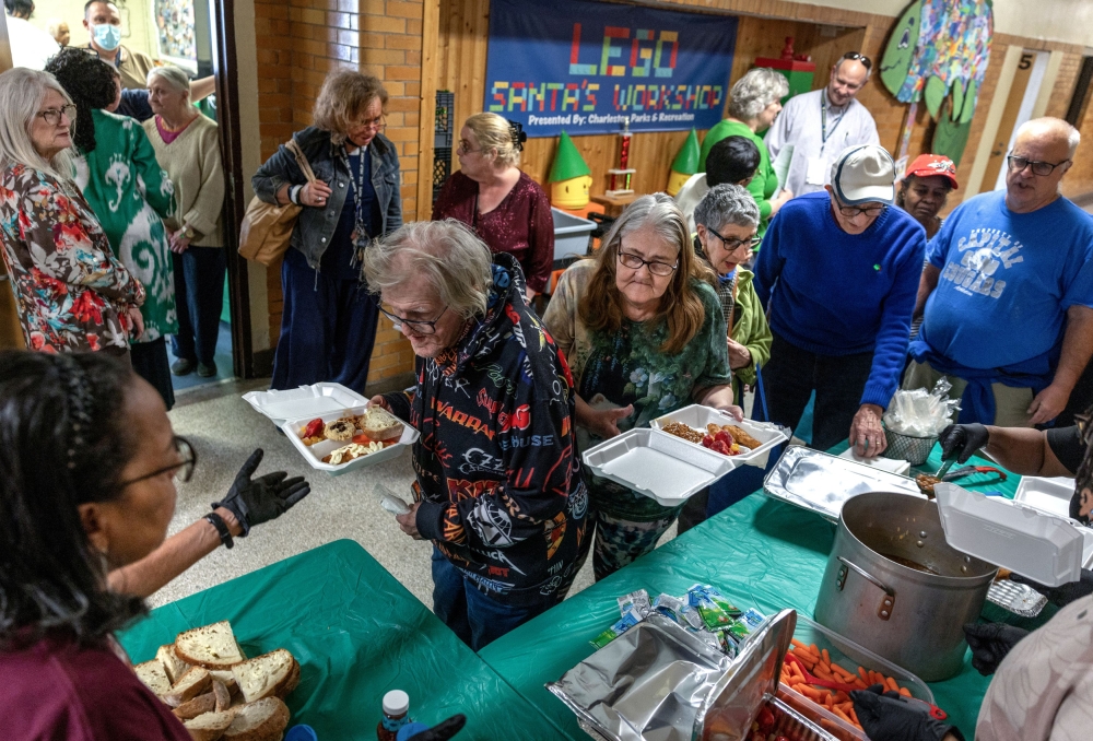 Senior citizens receive a hot meal at the Roosevelt Community Center as food banks across the country, already strained by rising demand, say they will have less food to distribute because of federal funding cuts and pauses by the Trump administration, in Charleston, West Virginia March 19, 2025. — Reuters pic