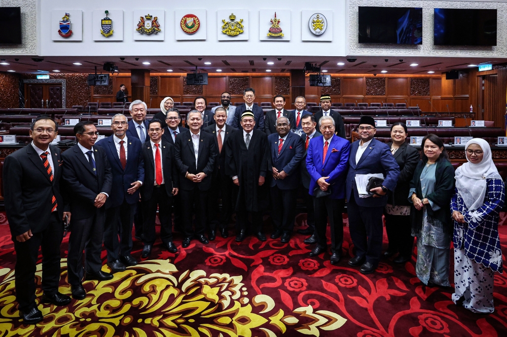 Dewan Negara President Datuk Awang Bemee Awang Ali Basah (centre) poses for a photo with members of the Senate to mark the conclusion of the First Meeting of the Fourth Session of the 15th Parliament. — Bernama pic