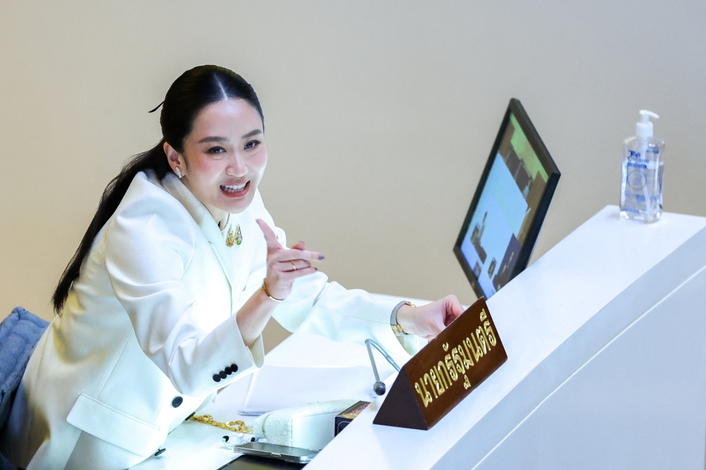 Thailand’s Prime Minister Paetongtarn Shinawatra gestures as she attends a no-confidence debate at the parliament in Bangkok March 24, 2025. — Reuters pic