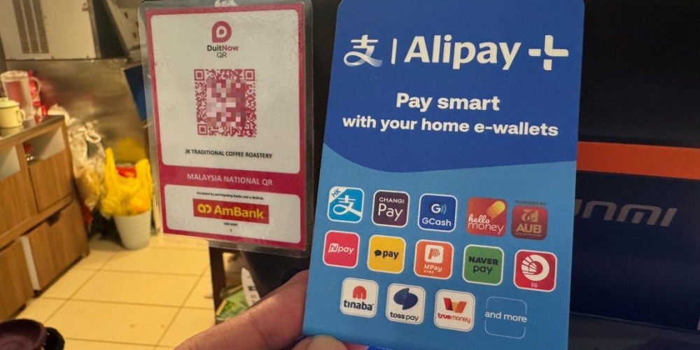 Tourists in Malaysia tap into DuitNow QR, with Alipay  powering 80 per cent of cross-border QR payments. — SoyaCincau pic
