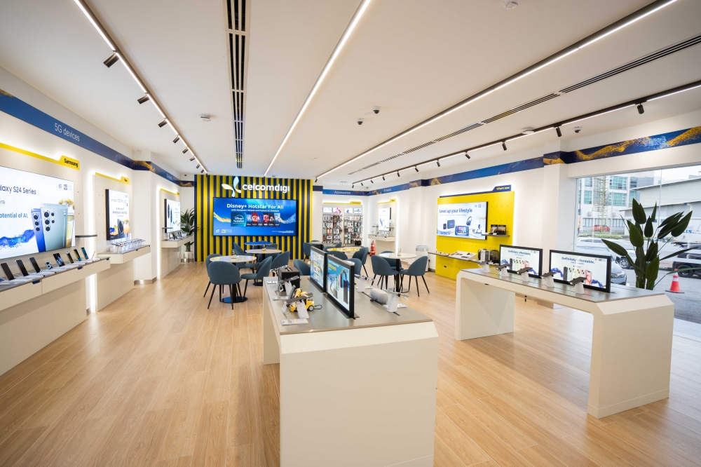 CelcomDigi has partnered with Italian design firm Pininfarina to redesign its retail stores, with updated layouts already implemented at 52 locations. — Picture courtesy of CelcomDigi