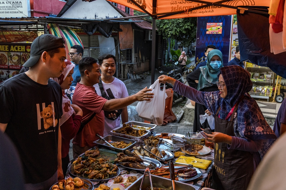 During Ramadan and Syawal, the demand for raw materials for food preparation surges dramatically. — Picture by Firdaus Latif