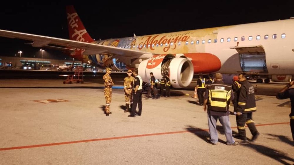 Flight AK128 landed safely at KLIA's Terminal 2 at 12.08 am. — Picture courtesy of Selangor Bomba