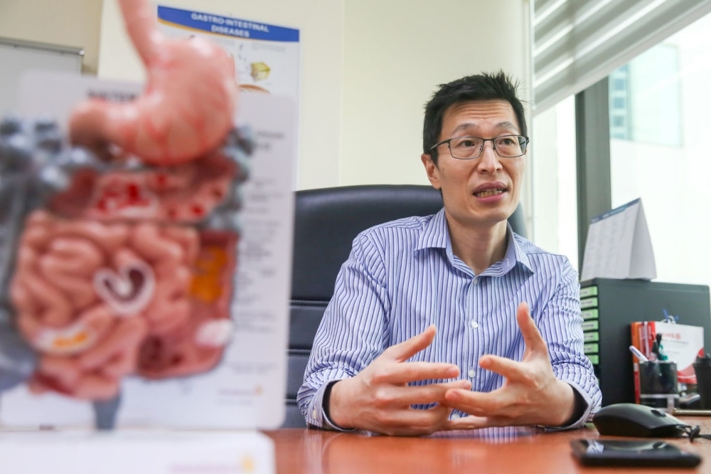 Subang Jaya Medical Centre consultant colorectal and general surgeon Dr Khong Tak Loon talks about the importance of stoma in a patient’s life. — Picture by Choo Choy May 