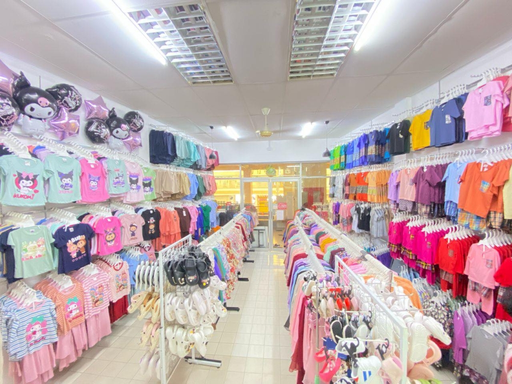For the past decade, Mohd Nizamuddin Johari and Roszaima Rosdi have been running Bella’s Little Box in Kuching, offering affordable children’s essentials under the “harga Rahmah” spirit, with Raya outfits priced as low as RM10. — Picture via Facebook/Bella's LittleBox Sarawak