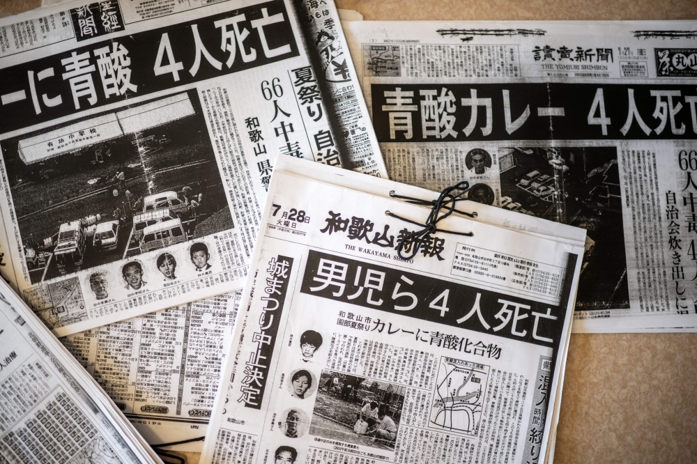 Copies of newspaper clippings about the Wakayama poison curry incident. — AFP