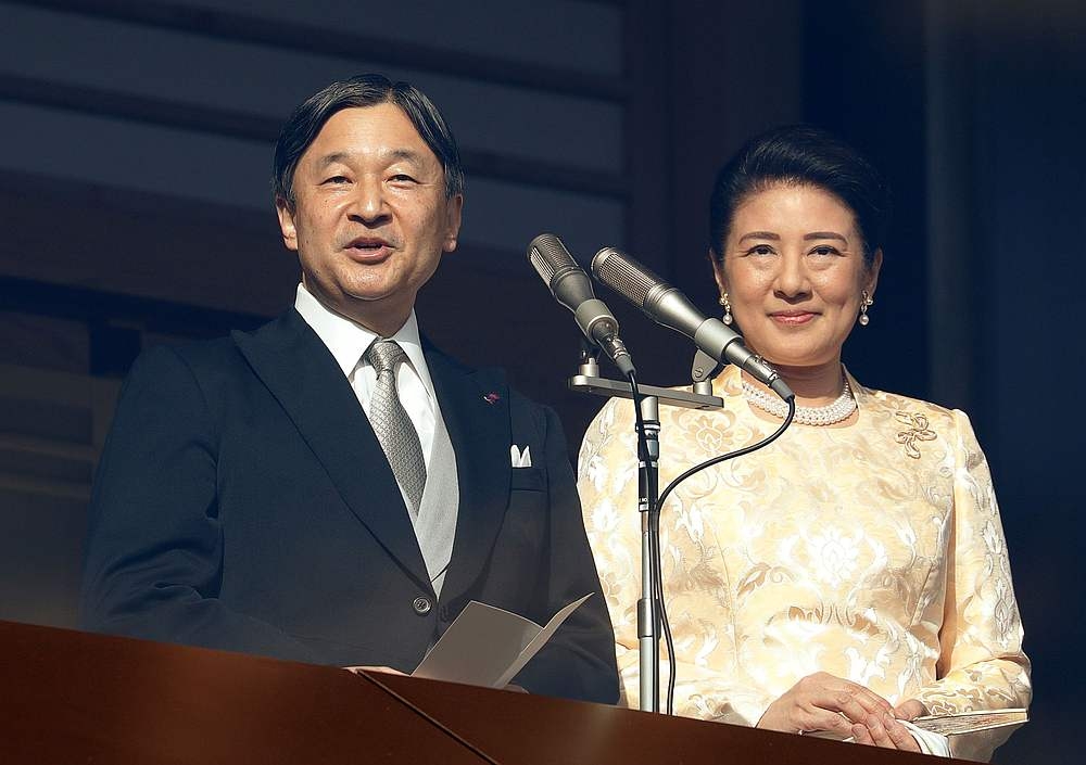 File photo of Japan's Emperor Naruhito making a speech next to Empress Masako during a public appearance for New Year celebrations at the Imperial Palace in Tokyo January 2, 2020. — Reuters pic