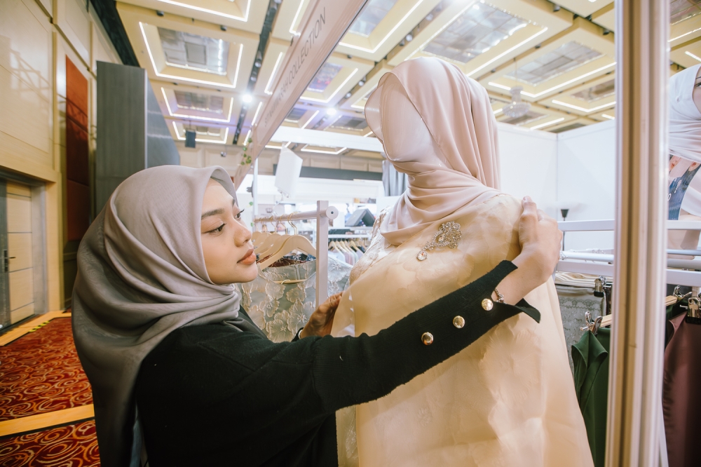 SN Design founder Siti Nawwarah is looking for a change of pace for her modest fashion brand this year. — Picture by Raymond Manuel