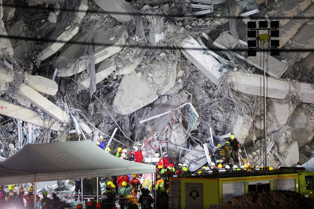 Rescue personnel work at the site of a building that collapsed in Bangkok, Thailand, on March 28, 2025, after a strong earthquake struck central Myanmar. — Reuters pic
