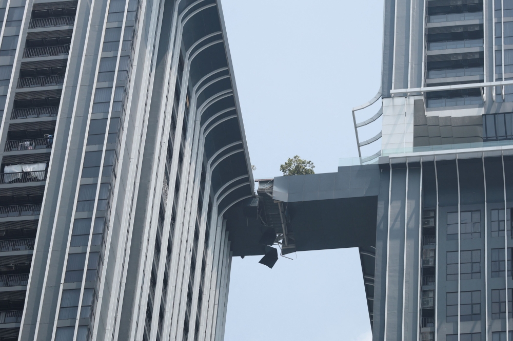 A bridge that connects two high-rise condominiums is seen damaged, following a strong earthquake, in Bangkok, Thailand, March 29, 2025. — Reuters pic