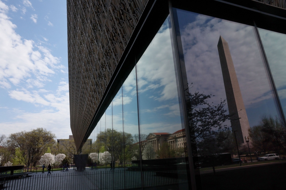 People enter and exit the Smithsonian’s National Museum of African American History and Culture in Washington, March 28, 2025. — Reuters pic