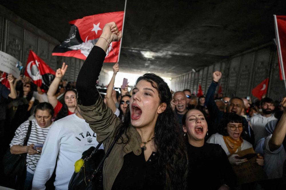 Protesters shout slogans after a rally called by the Republican People's Party (CHP) in Maltepe, on the outskirts of Istanbul on March 29, 2025. — AFP pic