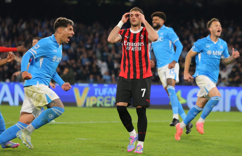 AC Milan's Mexican forward Santiago Gimenez reacts after missing a penalty shot during the match against Napoli. — AFP pic