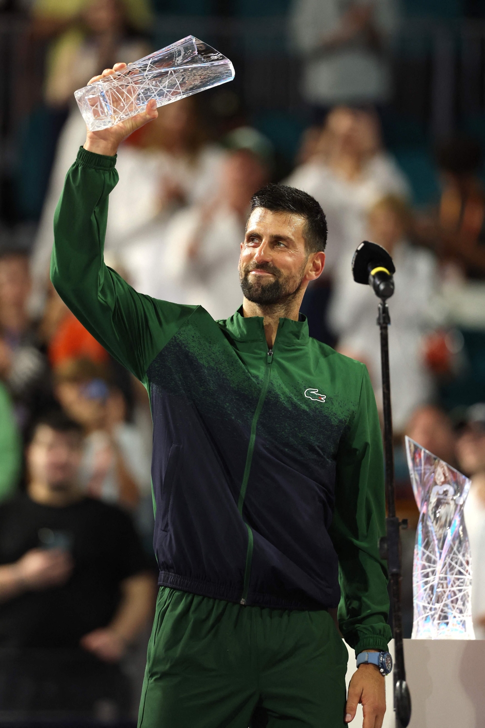 Novak Djokovic of Serbia poses with his trophy after losing to Jakub Mensik of the Czech Republic during the men's singles final on the last day of the Miami Open. — AFP pic