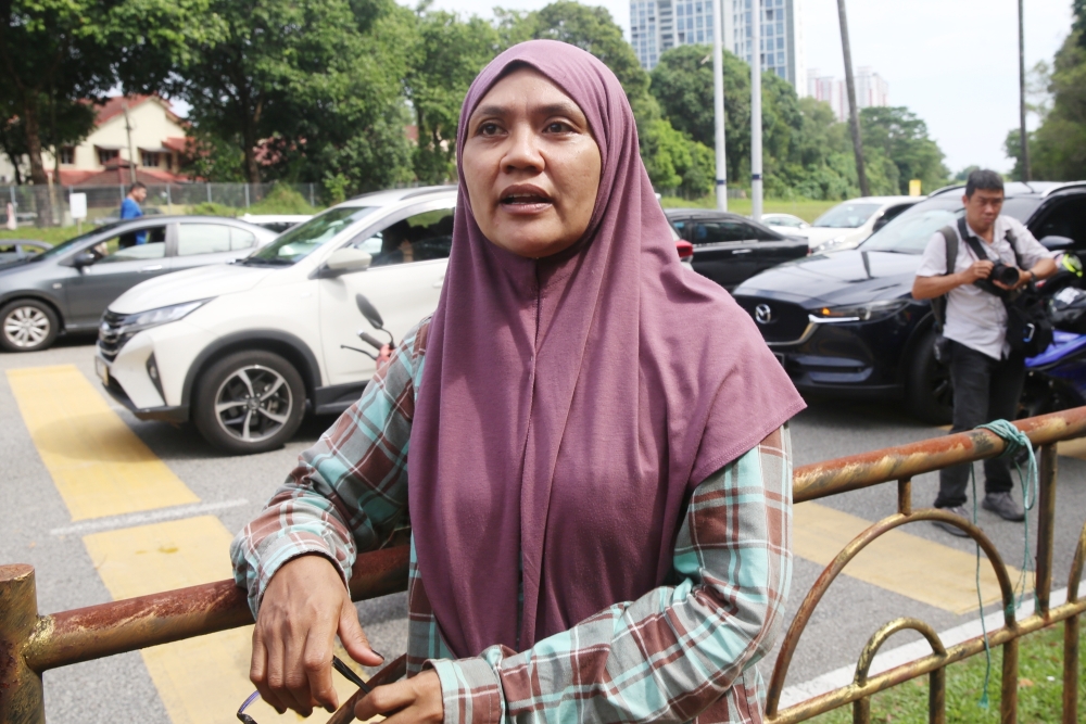 Watanaih Kayoon speaks to Malay Mail in Kampung Tengah Puchong on April 1, 2025. — Picture by Choo Choy May .