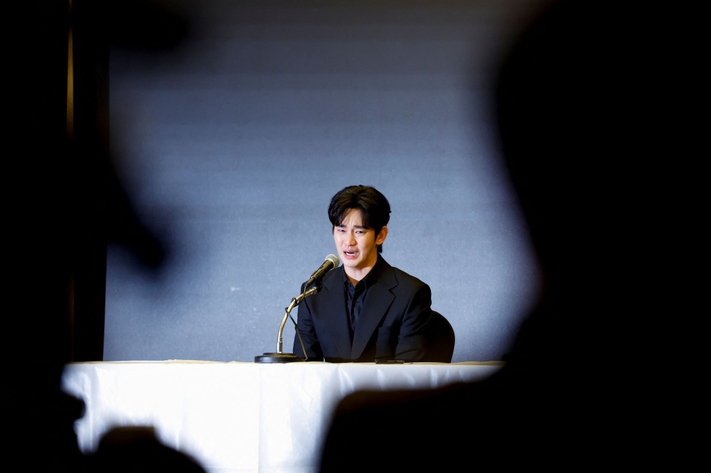 South Korean actor Kim Soo-hyun, embroiled in controversy over his relationship with actress Kim Sae-ron, who was found dead in February, reacts during a press conference in Seoul, South Korea, March 31, 2025. — Reuters pic