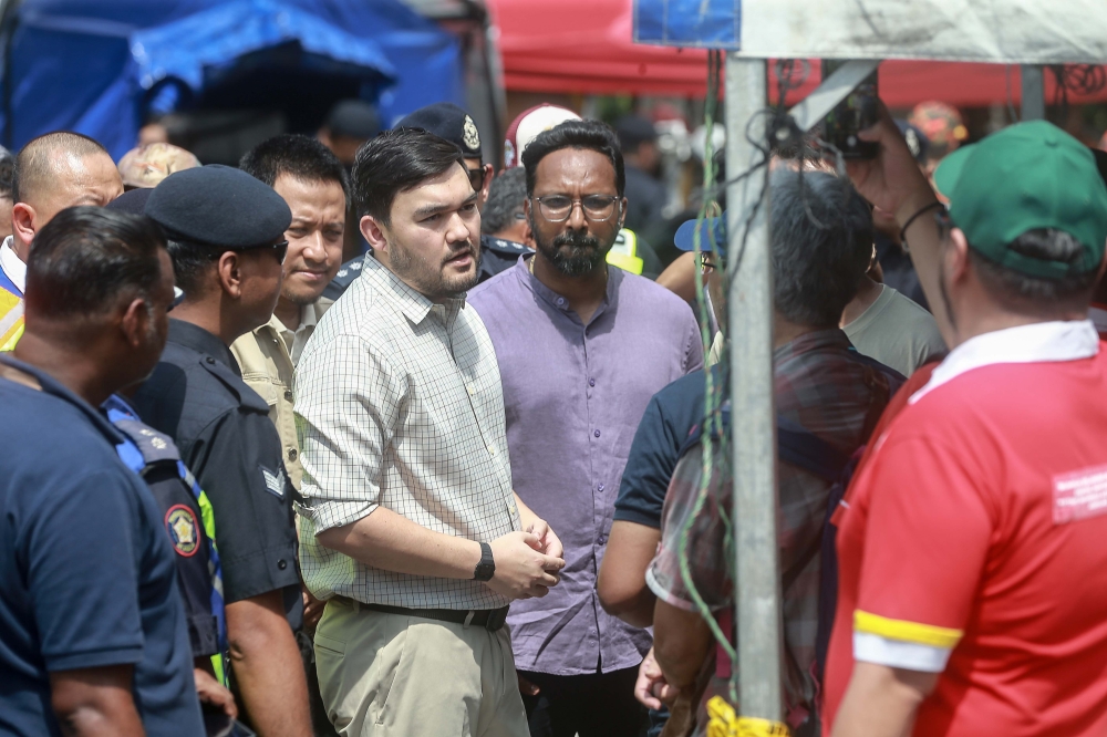 Raja Muda of Selangor Tengku Amir Shah Ibn Sultan Sharafuddin Idris Shah meets residents near ground zero following the gas pipeline fire at Putra Heights April 2, 2025. — Picture by Sayuti Zainudin