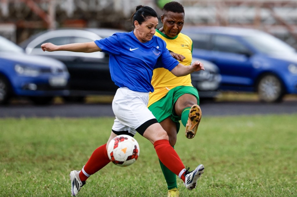 France’s Les Zamies Foot Frederique Dougier (left) fights for the ball with South Africa’s Mbombela Gogos Fikile Sithole (right) during the Grannies International Football Tournament 2025 semi-final match at Nkowankowa stadium in Tzaneen April 5, 2025. — AFP pic