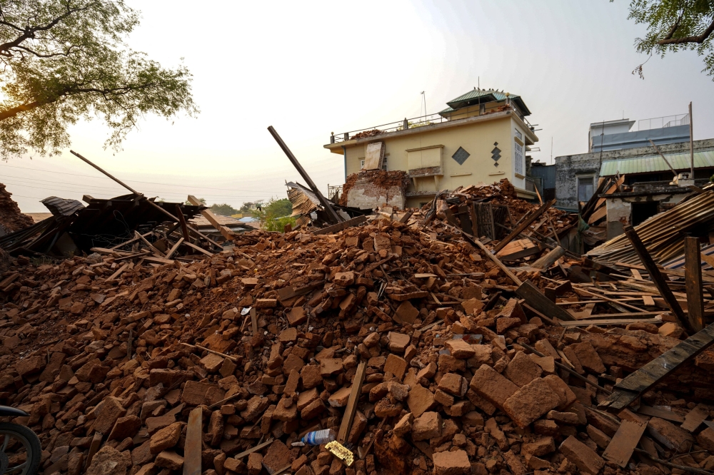 Rubble lies near a damaged building following a strong earthquake in Pyawbwe township, Mandalay, Myanmar, April 4, 2025. — Reuters pic